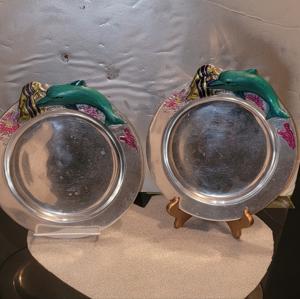 A PAIR OF VINTAGE ALUMINUM 9" DOLPHINS DECOR TRAYS SIGNED H.R HANDPAINTED